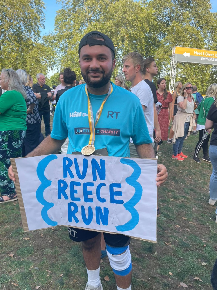 Runner with sign