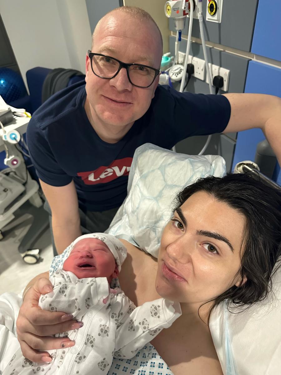 Baby Bogdan with his mum and dad